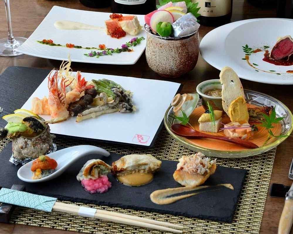 鮮魚と旬の野菜を天ぷらにした創作コース料理を心斎橋でご提供